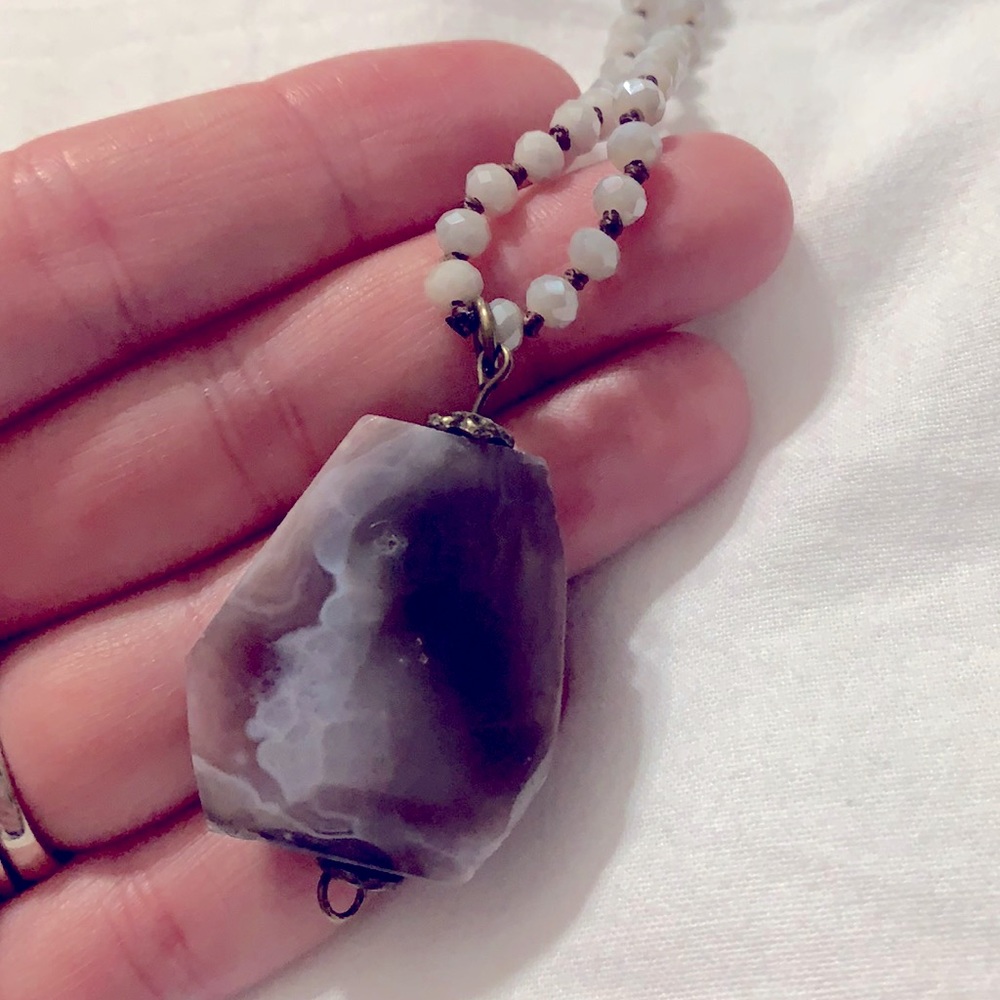 Granite type stone necklace. Gray and purple tones